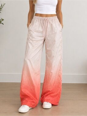 SNDYS. Flare Boot-Cut Pants in Pink & Orange